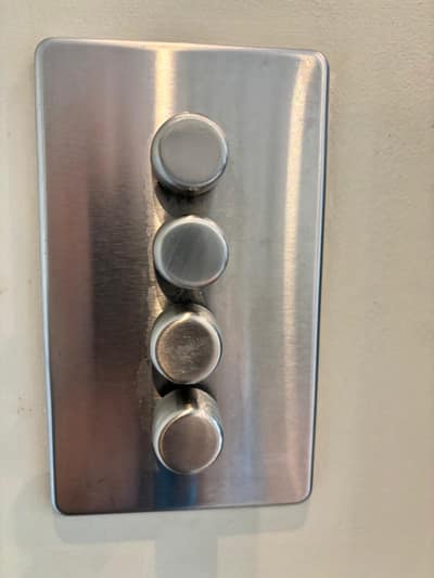 Brushed steel light switch plate wiped clean