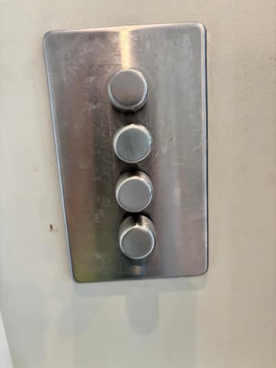 Brushed steel light switch plate