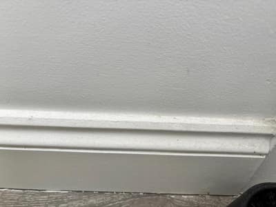 Clean white skirting board