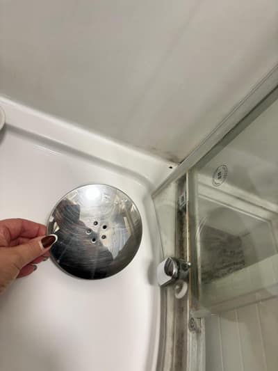 Cleaning the shower drain cover