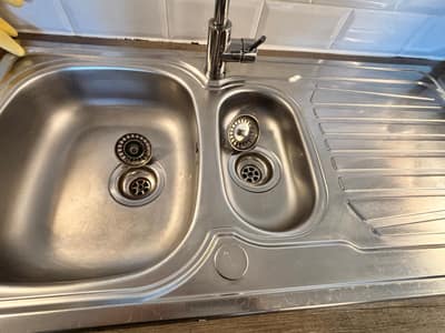 Stainless steel double sink and draining board