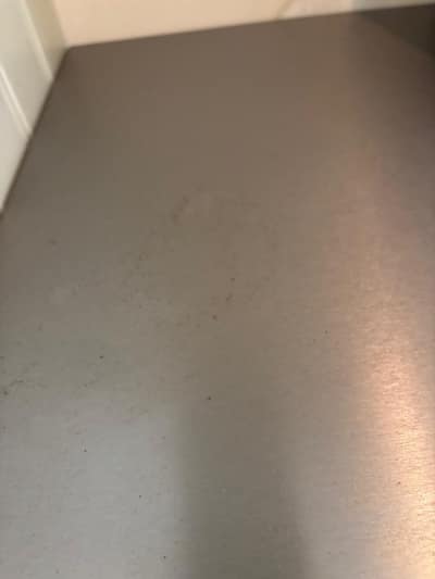 Close-up of a stainless steel surface after cleaning