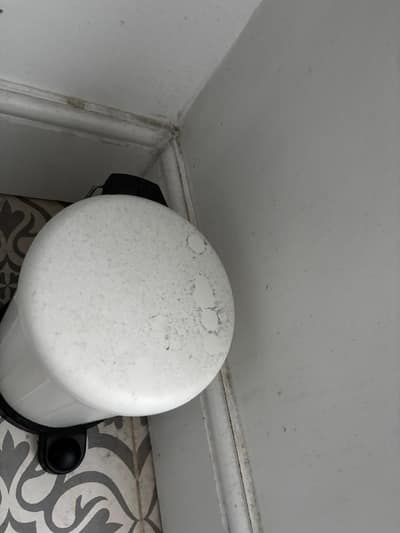 Bathroom pedal bin and skirting corner